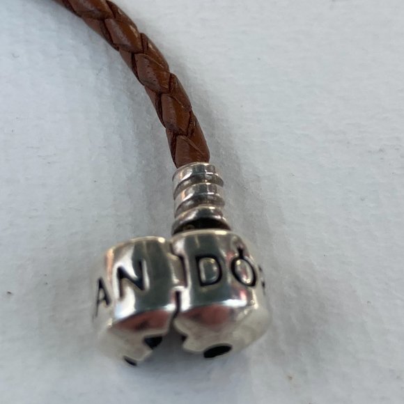 Pandora Jewelry - Pandora brownish leather bracelet with  16" sterling silver charm.